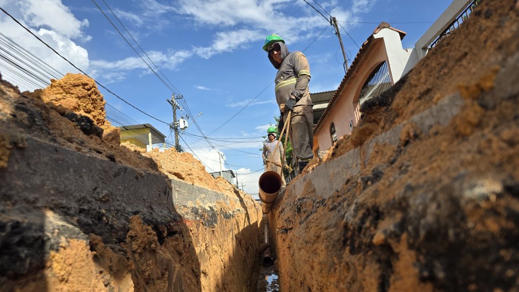 An exposed sewer cleanout pipe cap in a residential yard